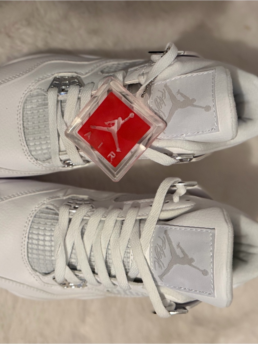 Jordan Women’s Sneakers in White with Red Hangtag